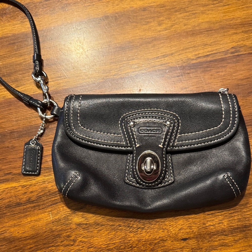 Coach Black Leather Clutch with Sleek Design